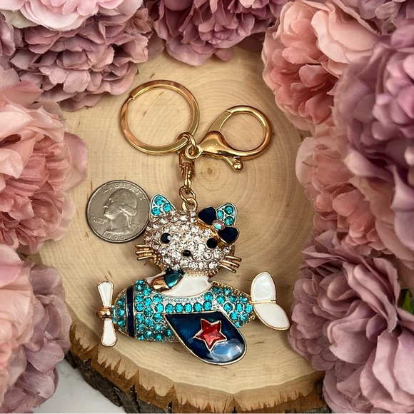 Hello Kitty Flying a Bkue Crystal Airplane Keychain Charm - Picture 14 of 16